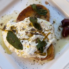 Burrata Cheese On Toasted Bread With Anchovy & Lemon Dressing